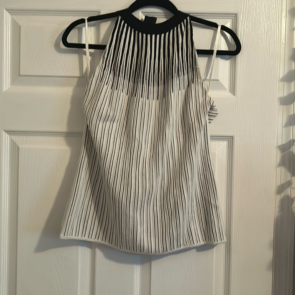 White House Black Market black, white, and gray striped mock neck with ribbon
